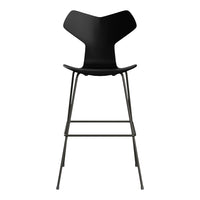 Black high stool with a sleek design and minimalist style. Features a clean, modern silhouette.