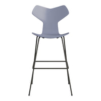 Modern bar stool featuring a sleek light gray seat and minimalist black metal legs. Perfect for contemporary decor.