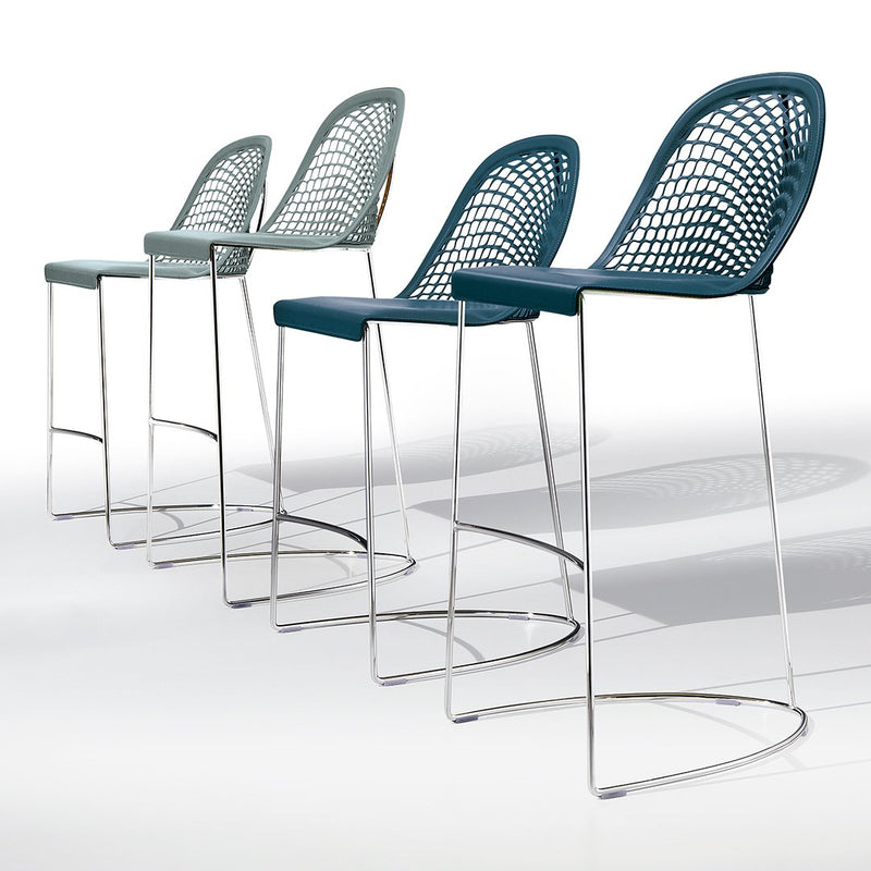 Stylish bar stools in teal and light blue with a modern woven pattern and sleek chrome legs. Perfect for any space.