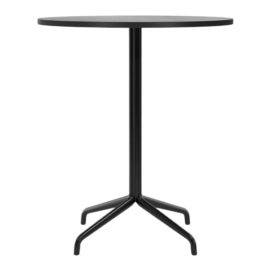 Round black table with a sleek, minimalist design featuring a solid surface and a simple four-legged base.