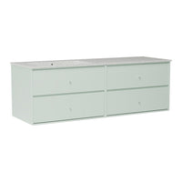 Light mint green dresser with four smooth drawers and a textured, patterned top. Ideal for modern decor.