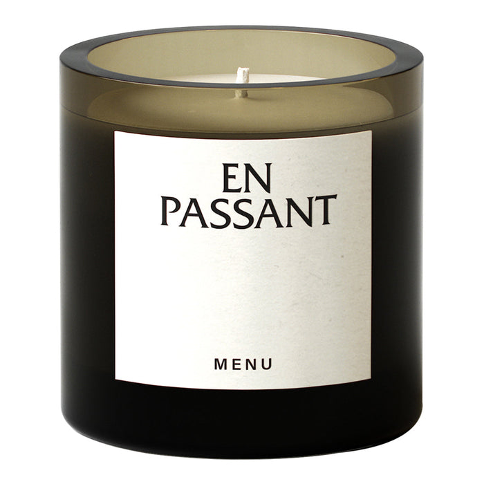 Black and smoky gray candle jar with a minimalist cream label, featuring bold black text.