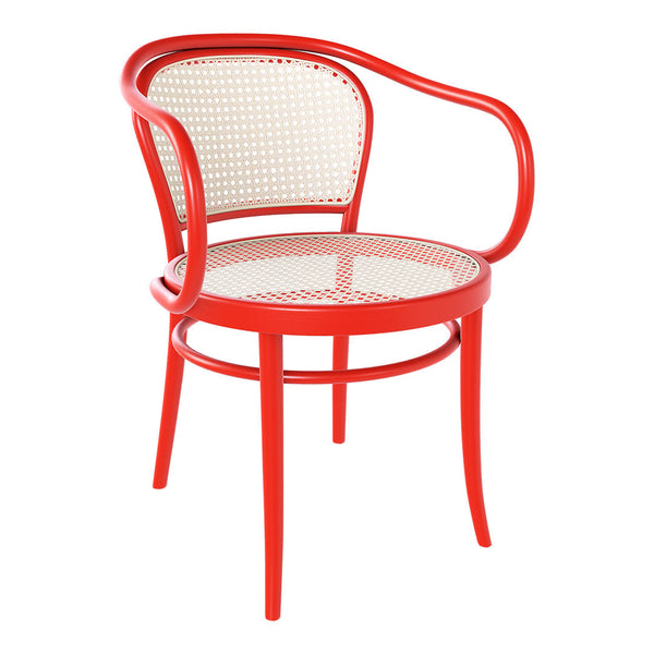 Vibrant red chair with a sleek, curved frame and a stylish caned seat pattern, perfect for modern decor.