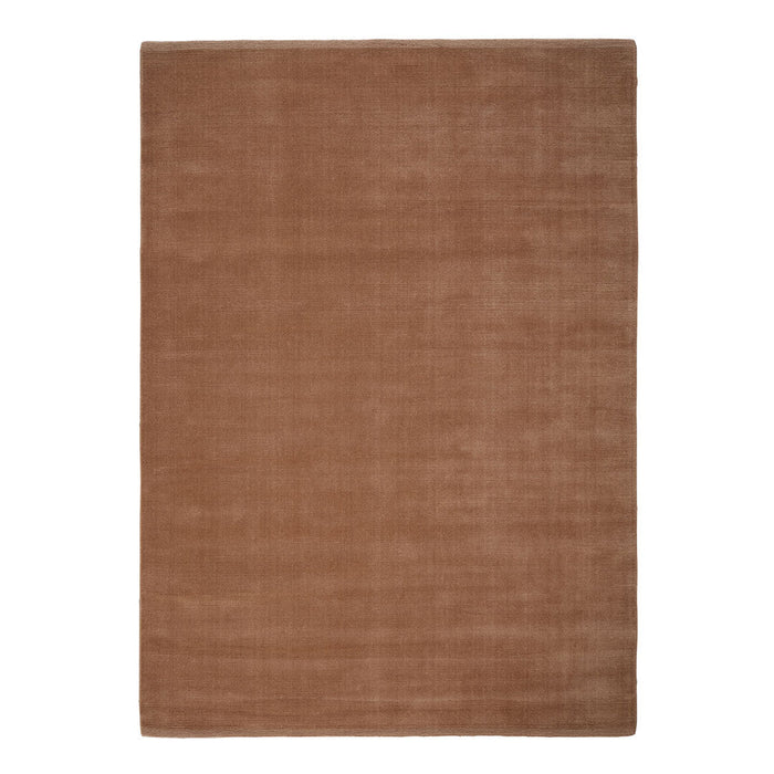 Solid brown area rug with a smooth texture, perfect for adding warmth and elegance to any space.