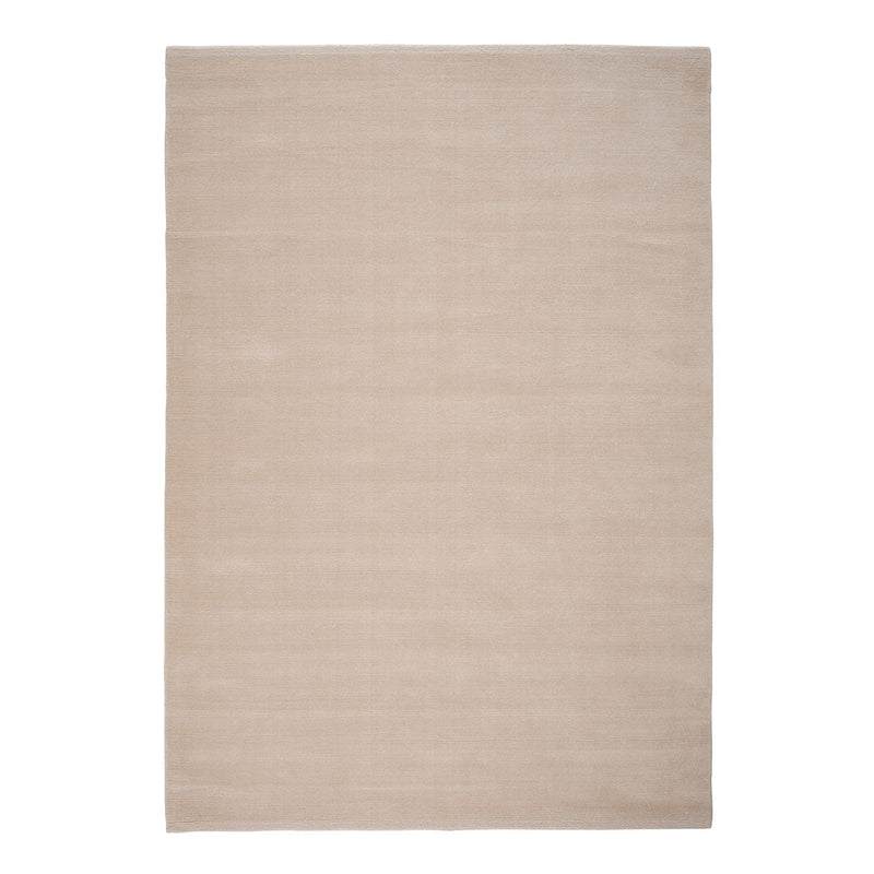 Neutral beige area rug with a smooth, solid pattern, perfect for modern and minimalist decor.