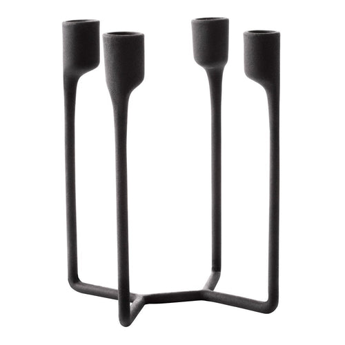 Black metal candle holder with a minimalist design and sleek, smooth finish. Ideal for modern decor.