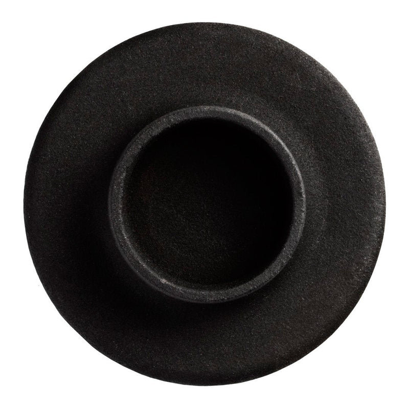 Round black ceramic vase with a smooth matte finish and subtle texture, embodying minimalist design.