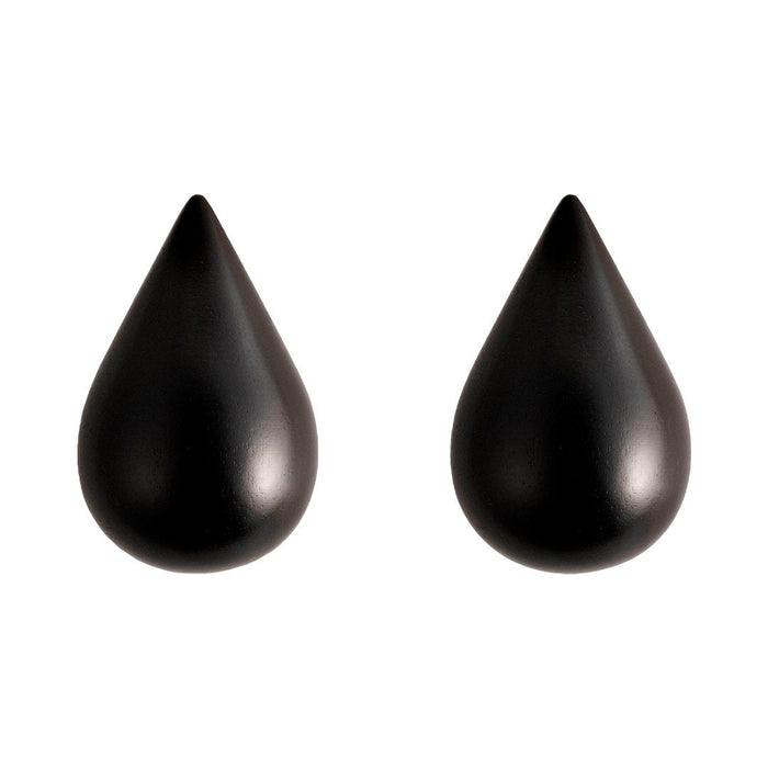 Black teardrop-shaped earrings with a smooth, glossy finish. Perfect for a modern, elegant look.