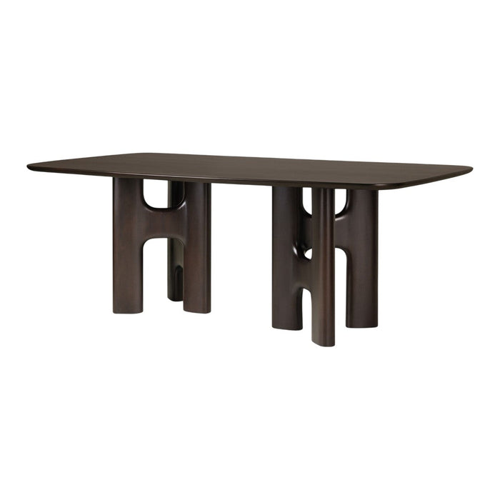 Dark brown rectangular table with unique cut-out patterns on cylindrical legs, offering a modern, stylish look.
