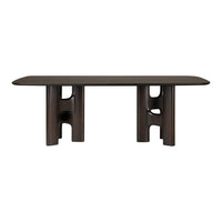 Brown rectangular table with smooth surface and unique cut-out patterns on supporting legs, showcasing modern design.