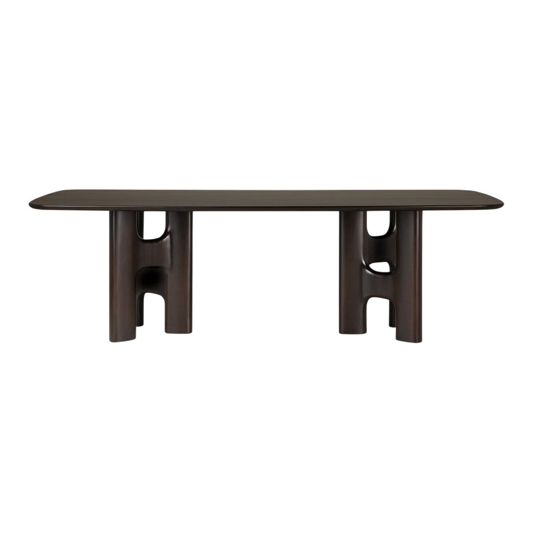 Dark wood coffee table with smooth surface and unique cut-out patterns on legs for a modern look.