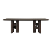 Dark wood coffee table with smooth surface and unique cut-out patterns on legs for a modern look.
