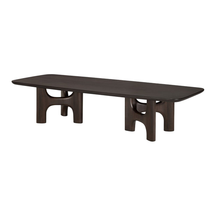 Dark brown coffee table with smooth surface and unique curved leg design. Modern, minimalist aesthetic for stylish decor.