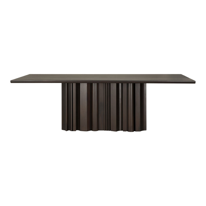 Dark brown dining table with textured, ribbed design and a sleek rectangular top, perfect for modern interiors.