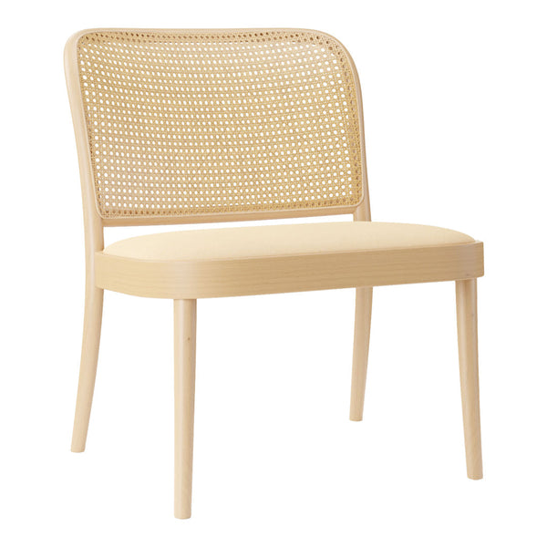 Light beige chair with a woven rattan backrest and a simple upholstered seat, creating a natural, warm aesthetic.