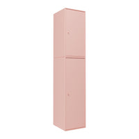 Tall, modern storage cabinet in soft pink with a smooth, matte finish and minimalist design.