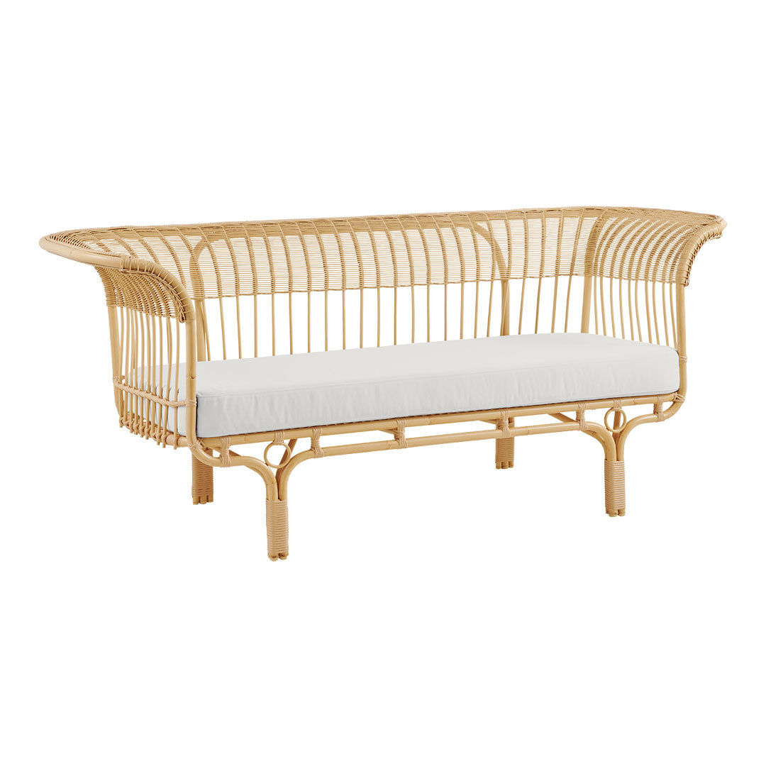 Natural rattan sofa with a sleek open weave design and a crisp white cushion for a fresh, modern look.