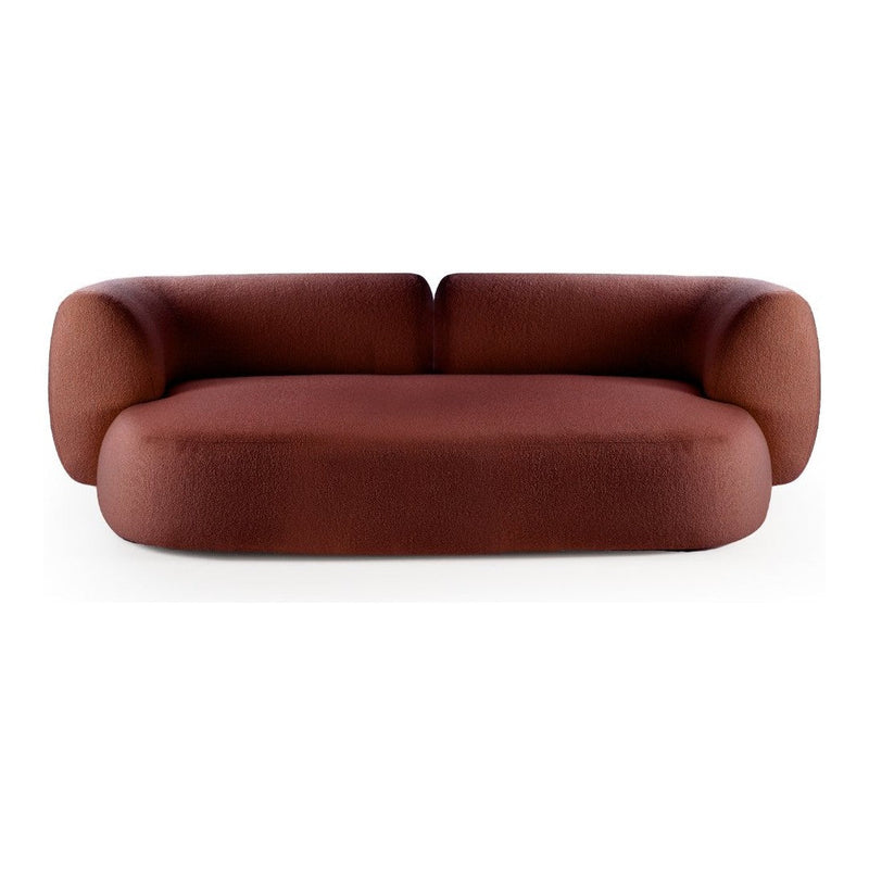 Brown sculptural sofa with rounded edges and a smooth, modern fabric texture. Ideal for contemporary living spaces.