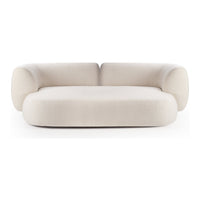 Soft beige sofa with rounded edges and plush, smooth fabric. Contemporary design, minimal patterns, perfect for modern decor.