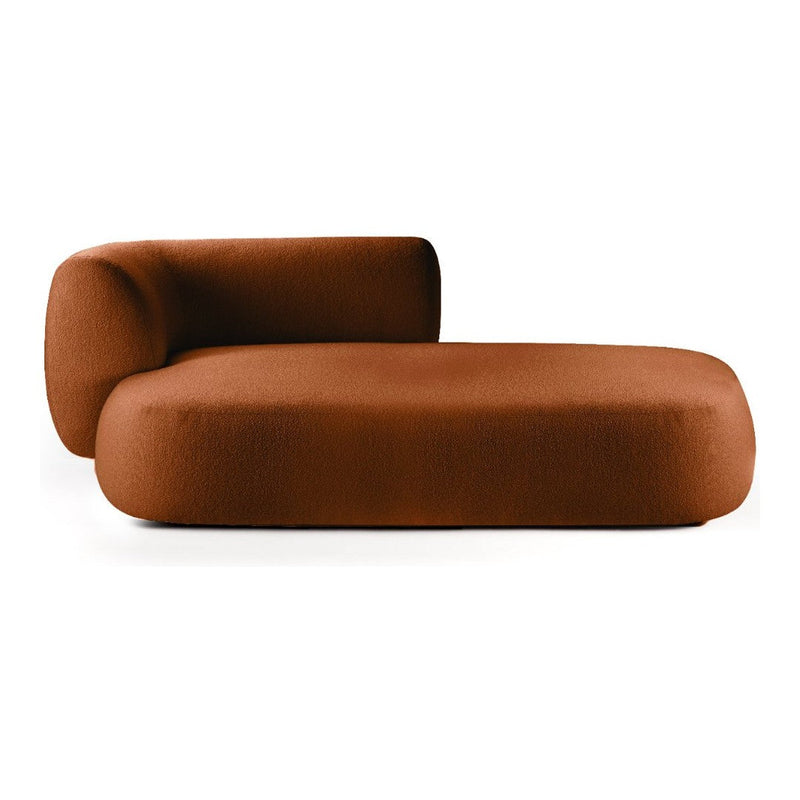 Organic-shaped lounge chair in rich rust orange fabric with a smooth, minimalist design. Ideal for modern interiors.