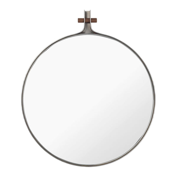 Round silver mirror with a minimalist design, featuring a subtle brown cross detail for added elegance.