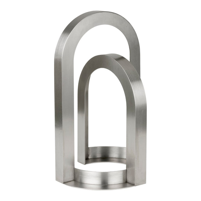 Sleek silver stainless steel sculpture with smooth, curved arches and a minimalist design. Perfect for modern decor.