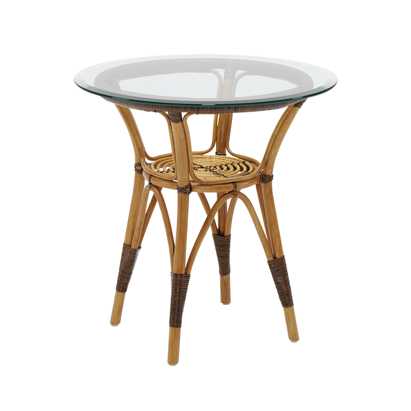 Round rattan side table with natural bamboo finish and clear glass top, featuring woven textures and earthy tones.