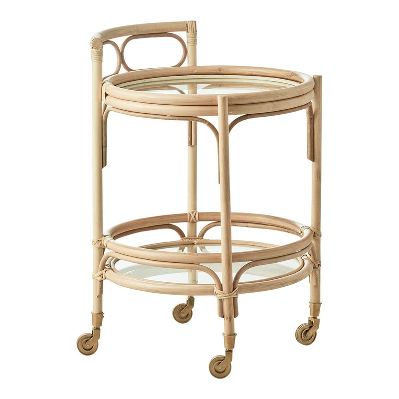Light beige rattan serving cart with glass shelves and elegant circular patterns, featuring rolling wheels for mobility.