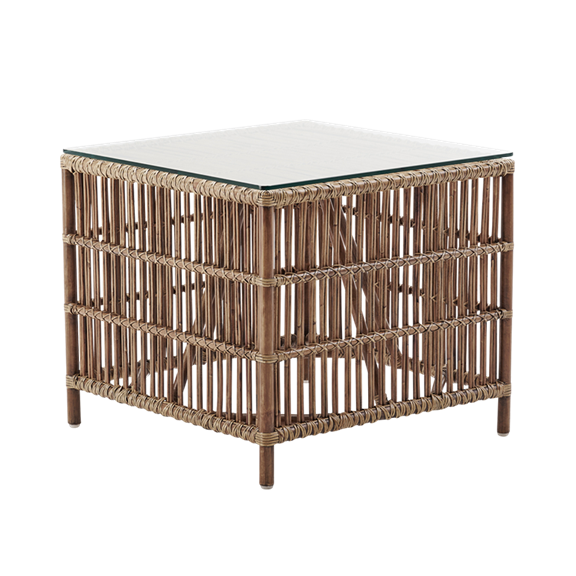 Natural rattan side table with glass top, featuring a woven texture and warm brown tones. Perfect for modern decor.