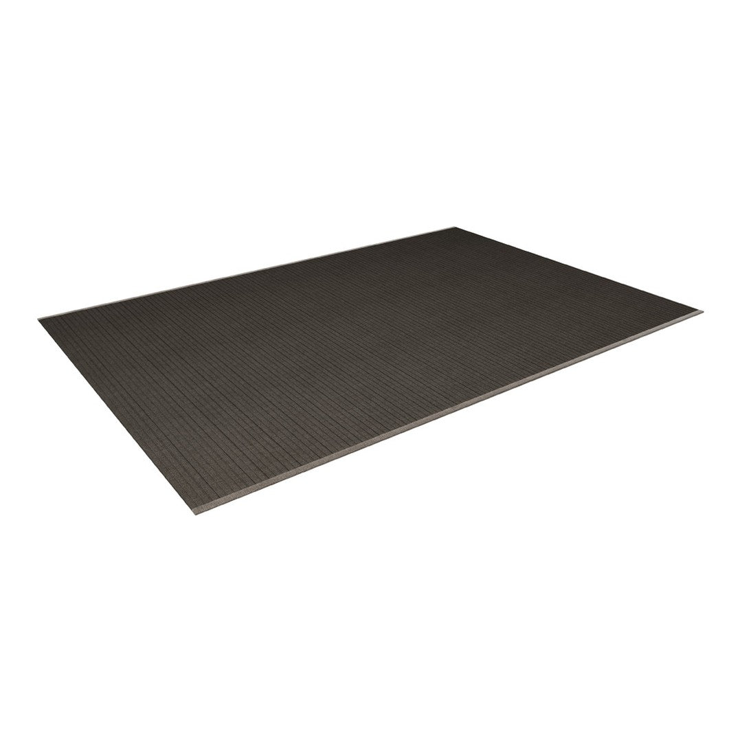 Dark gray textured mat with subtle pattern, perfect for versatile interior decor and contemporary style.