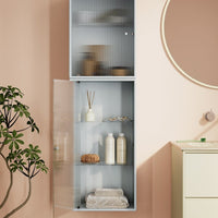 Modern glass-front cabinet in soft blue with clear shelves, complemented by beige tones and subtle textures.
