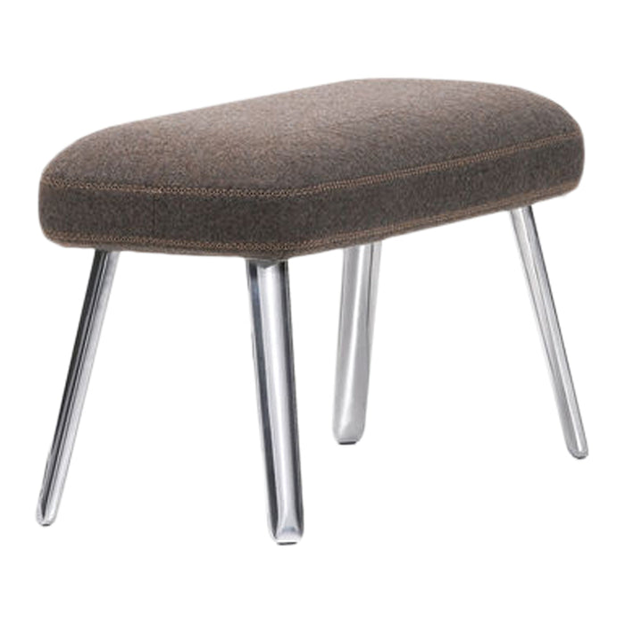 Brown upholstered stool with a sleek, silver metal base, featuring a minimalist design and soft texture.