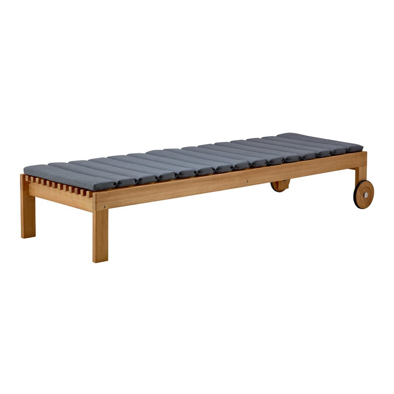 Gray cushioned outdoor lounge bed with a natural wood frame and subtle horizontal slat pattern.
