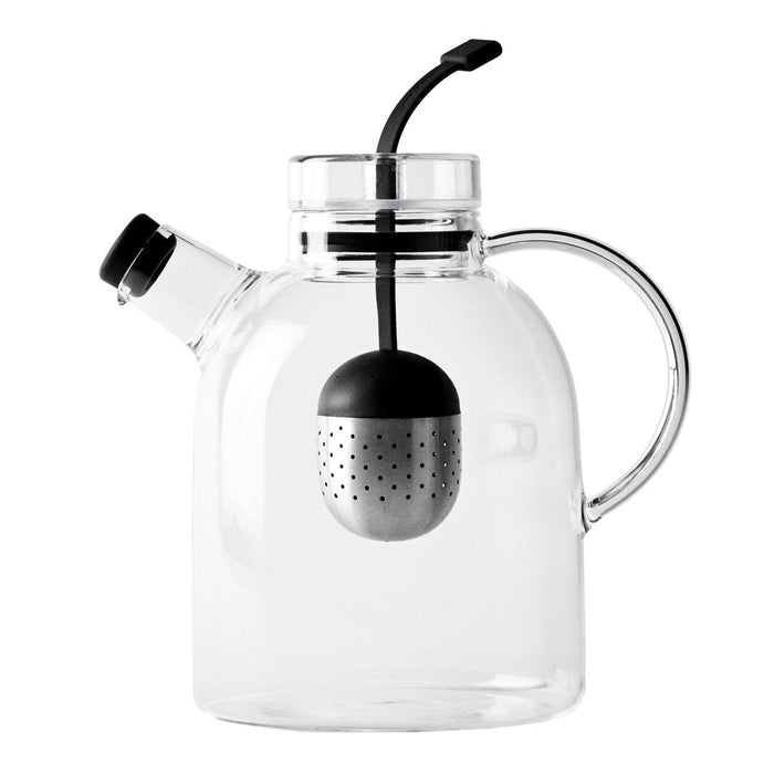 Clear glass teapot with a black tea infuser, featuring smooth, modern lines and a minimalist design.