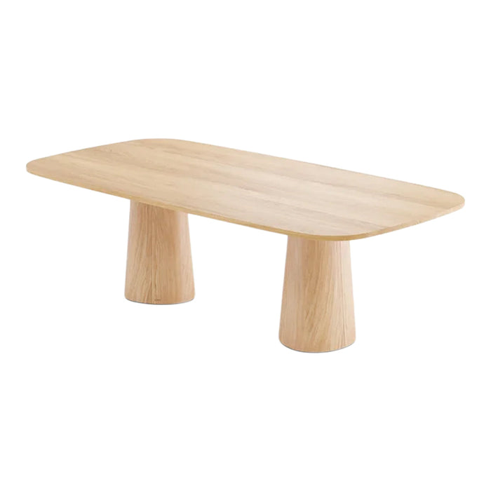 Light natural wood coffee table with a smooth oval top and rounded cylindrical legs. Elegant minimalist design.