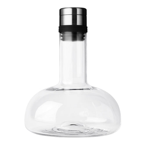 Clear glass carafe with a sleek black and silver metal cap, featuring a modern, minimalist design.