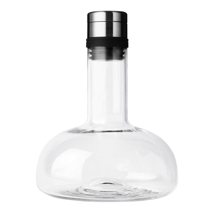 Clear glass carafe with a sleek black and silver metal cap, featuring a modern, minimalist design.