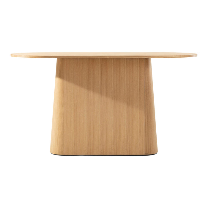 Light oak wood table with a smooth, rounded top and textured vertical grain. Minimalist design for modern decor.