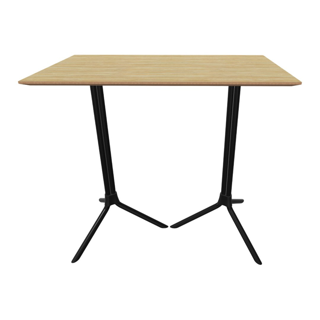 Light wood tabletop with a subtle grain pattern, supported by sleek black metal legs for a modern touch.