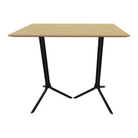 Light wood tabletop with a subtle grain pattern, supported by sleek black metal legs for a modern touch.