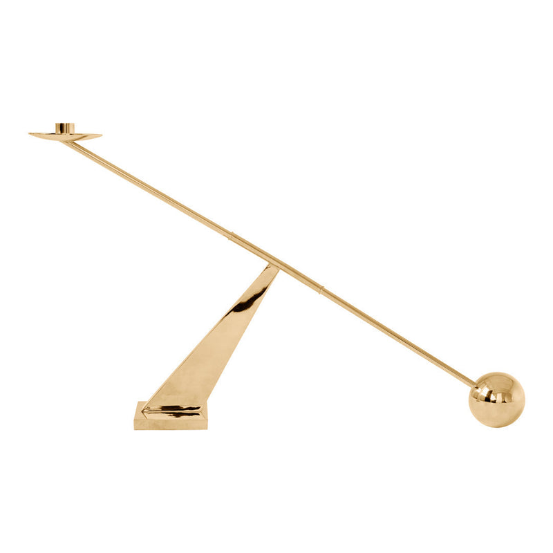 Sleek gold candlestick holder with a modern geometric design and a polished finish.