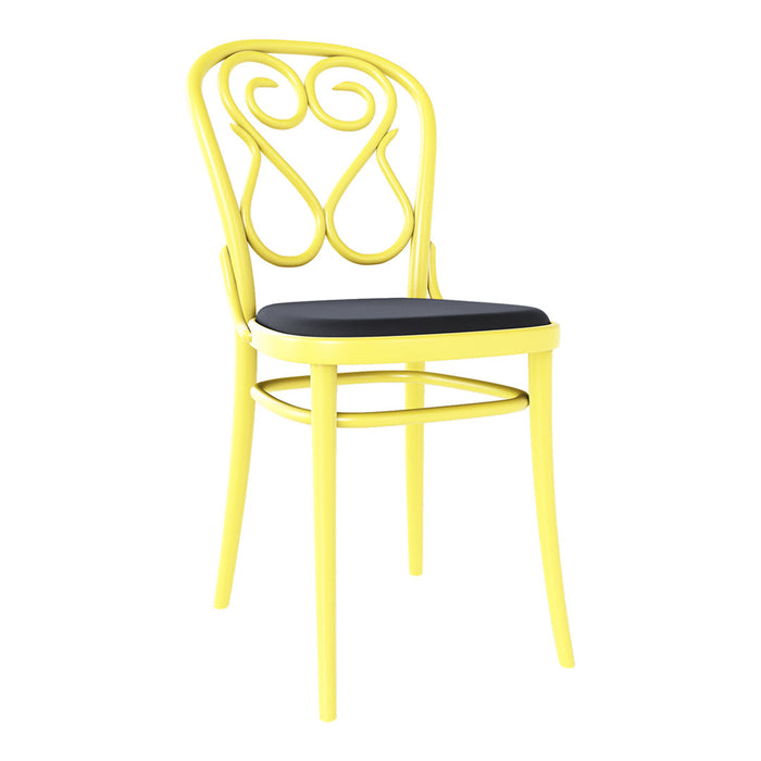 Yellow decorative chair with a swirling backrest and a sleek black seat, perfect for brightening any space.