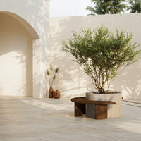 "Modern outdoor furniture in earthy tones with natural wood and neutral beige surroundings, featuring minimalist design."