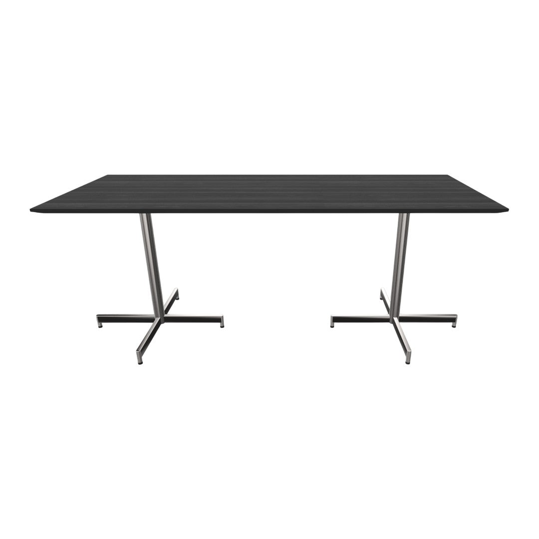 Modern black rectangular table with sleek silver metal legs, featuring a smooth wood grain pattern on the surface.