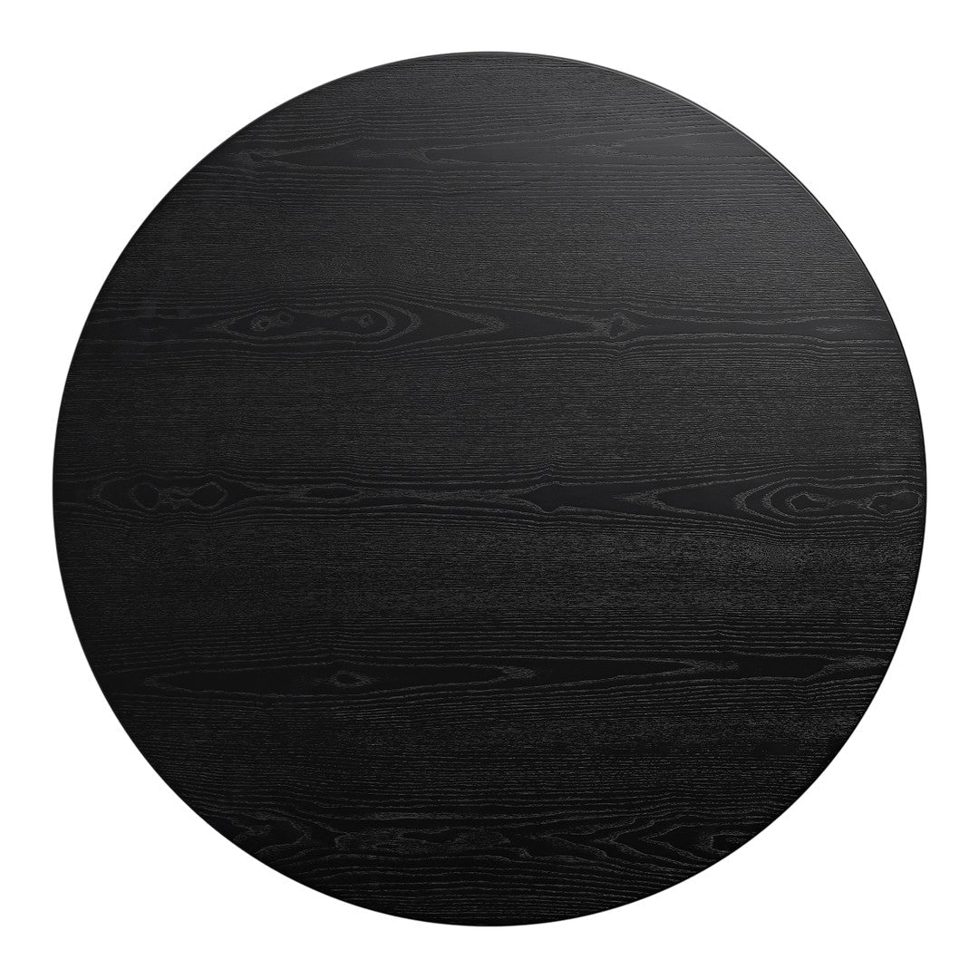 Round table with a sleek black finish and subtle wood grain pattern. Ideal for modern and minimalistic decor.