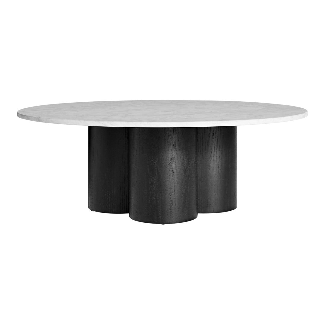 Round white tabletop with three black cylindrical bases, featuring a sleek, modern design. Ideal for contemporary decor.