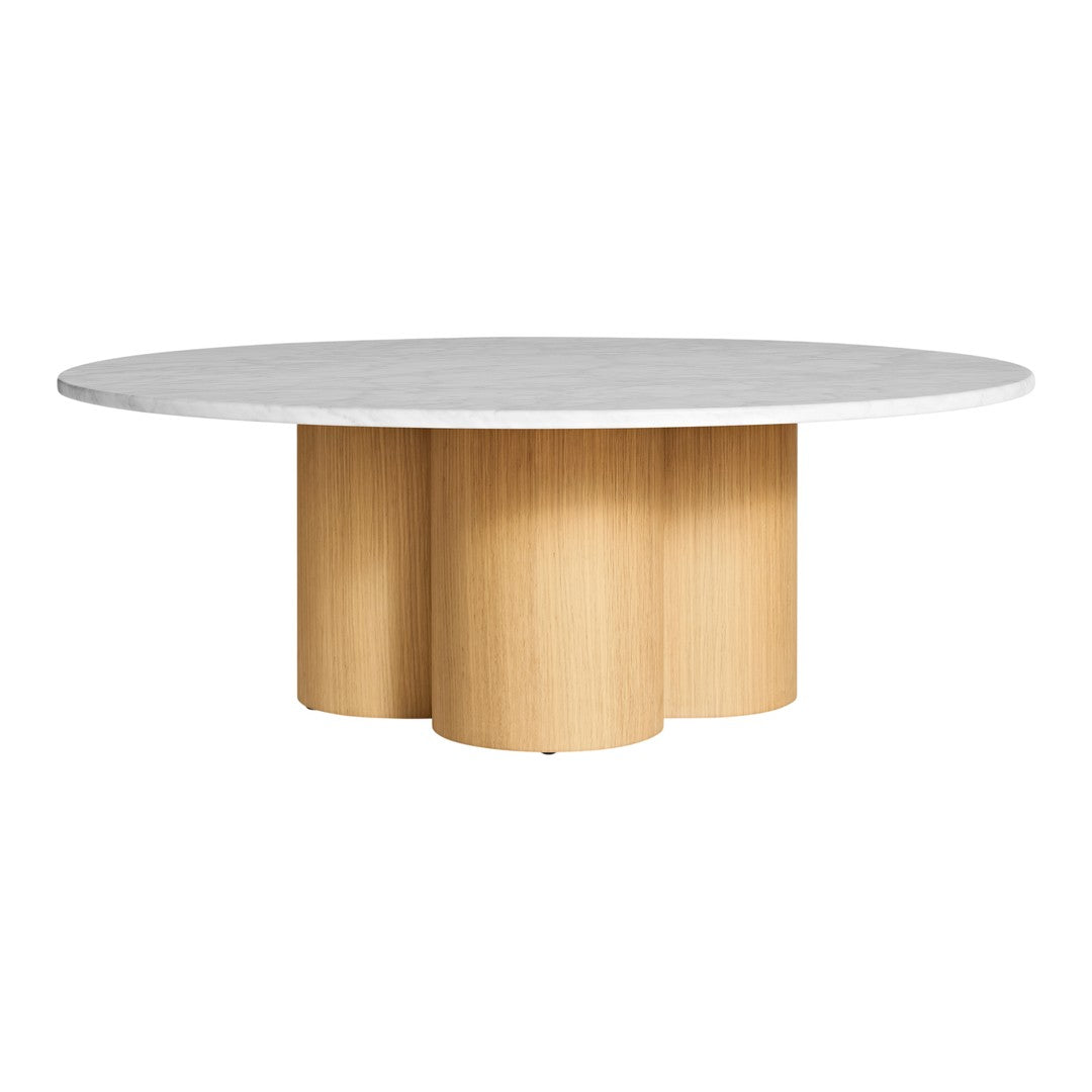 Round white marble tabletop with natural wood base featuring vertical grooves. Elegant and modern design for any space.