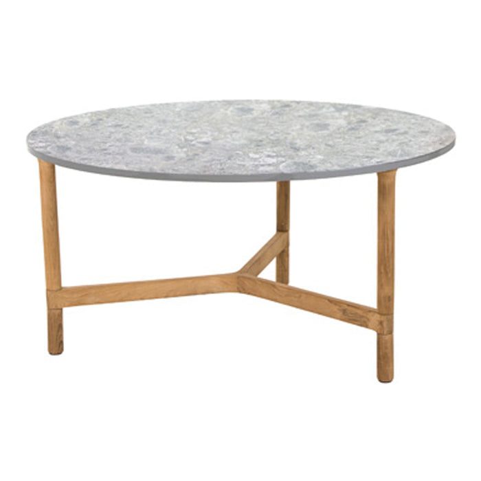 Round coffee table featuring a gray stone top with natural patterns and a light wooden base.