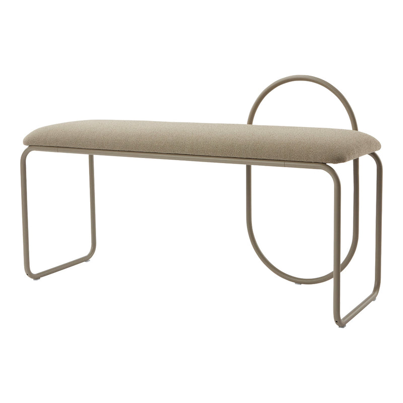 Beige upholstered bench with curved metal frame and minimalist design, perfect for modern decor.
