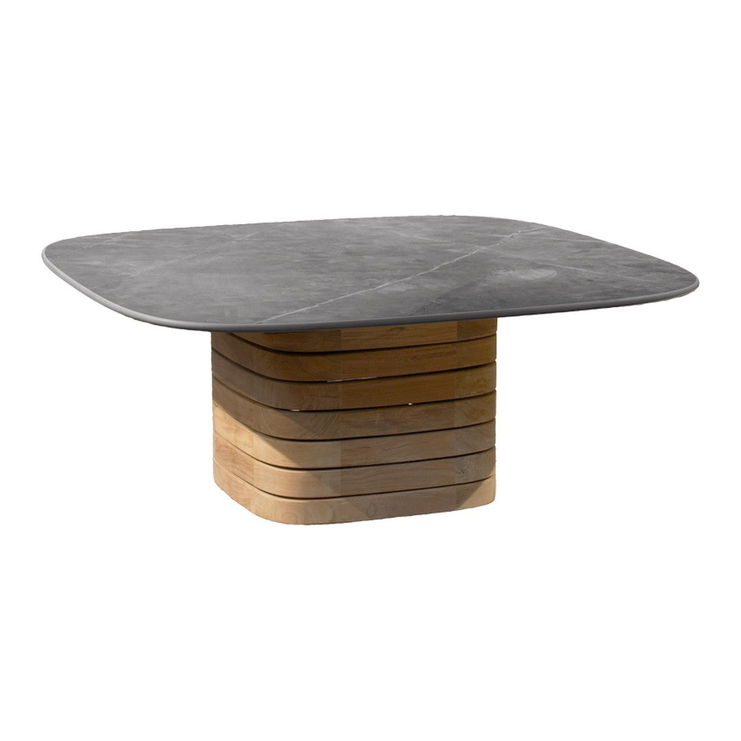 Modern square table with a smooth grey top and a stylish wooden slat base. Perfect for contemporary decor.